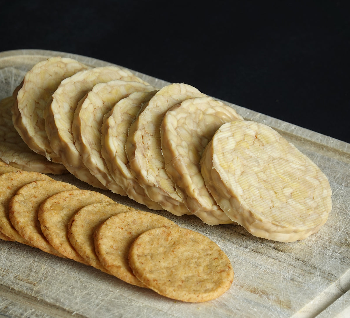 tempeh stacked with snacks